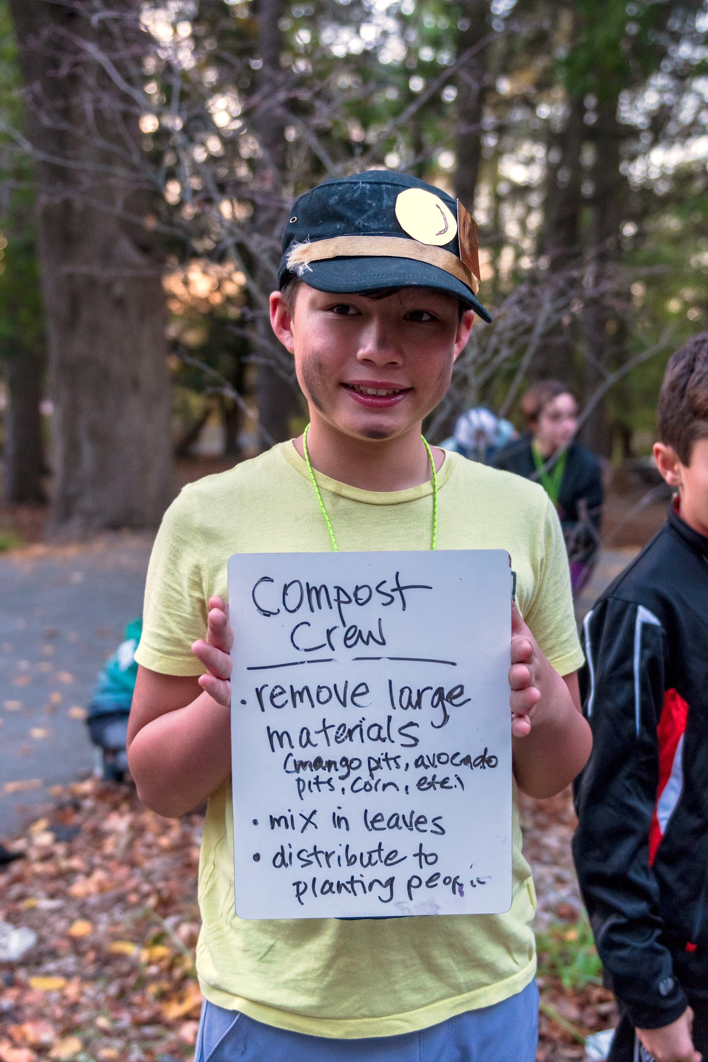 A young Wayfinders participant helping with stewardship work